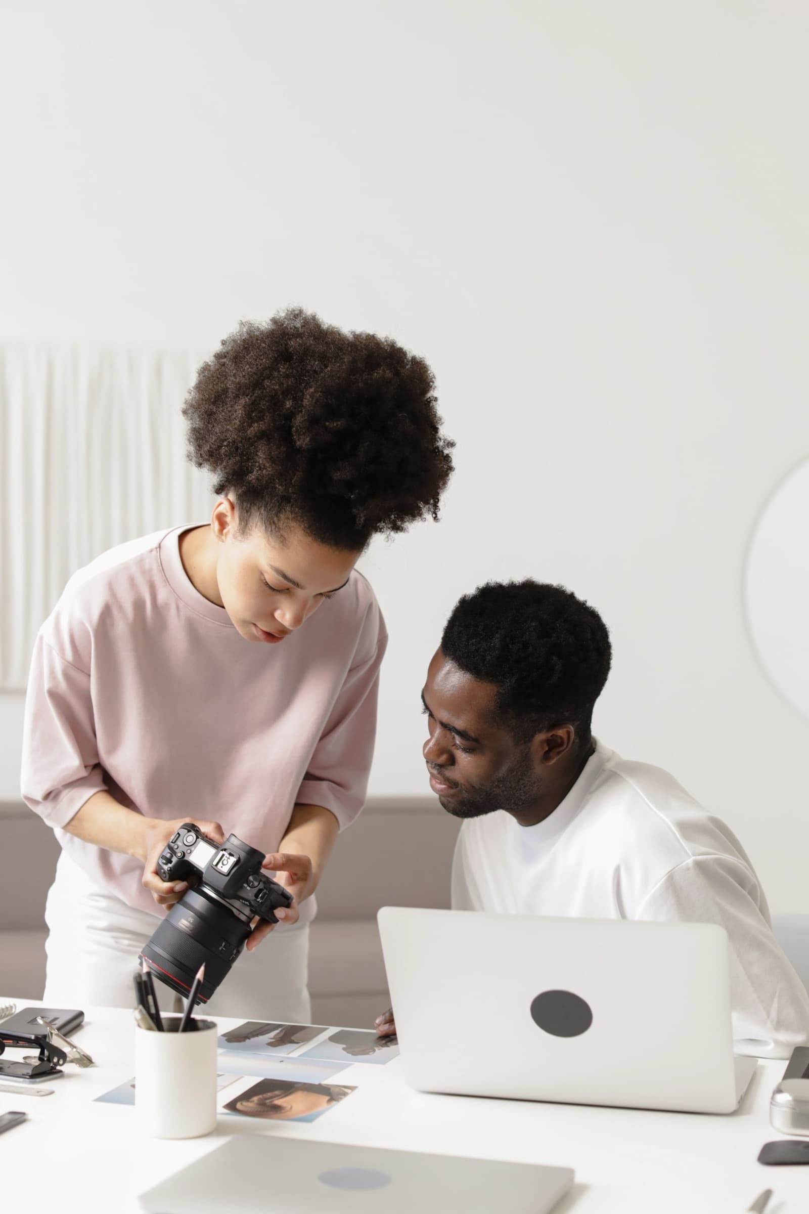 Photographer and creative director reviewing shots