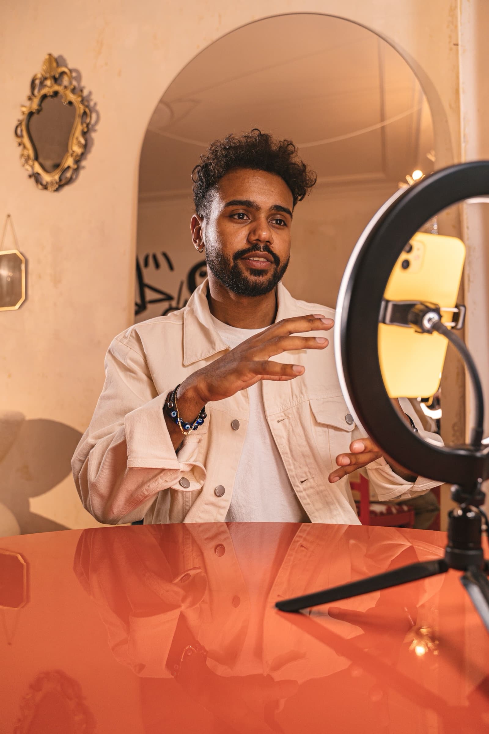 Creator filming with a ring light